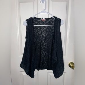 Woman’s black vest cardigan